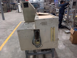 Tube sticking machine